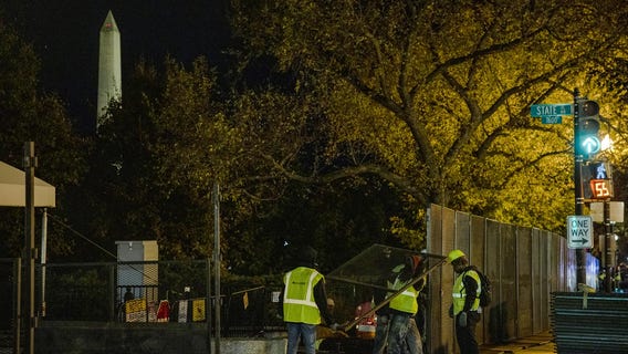 'Non-scalable' fence up near White House, helicopters seen as DC prepares for possible election unrest