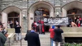 DC church re-hangs Black Lives Matter banner destroyed during protest clashes
