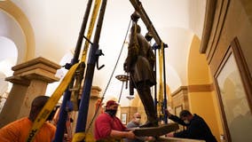 Robert E Lee statue removed from US Capitol, Virginia governor says