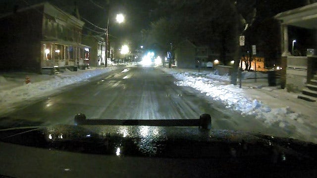Slick, icy roads after overnight freezing; breezy, cold Thursday with highs in the 30s
