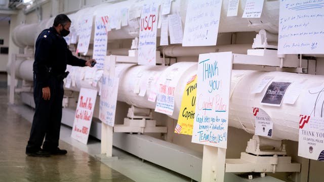 'Thank You' notes to officers cover Capitol building walls after riots