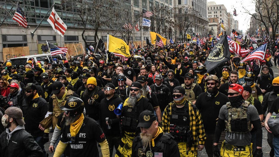 Members of the Proud Boys march towards Freedom Plaza during a protest on Dec. 12, 2020 in Washington, D.C. (Photo by Stephanie Keith/Getty Images)