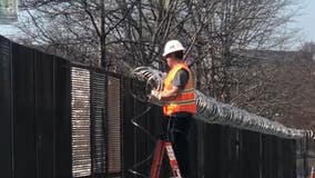 Some razorwire in the Capitol Hill area being removed