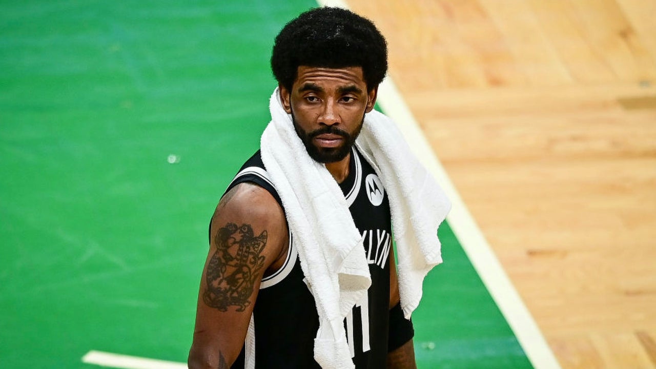 Celtics fan charged after throwing water bottle at Kyrie Irving