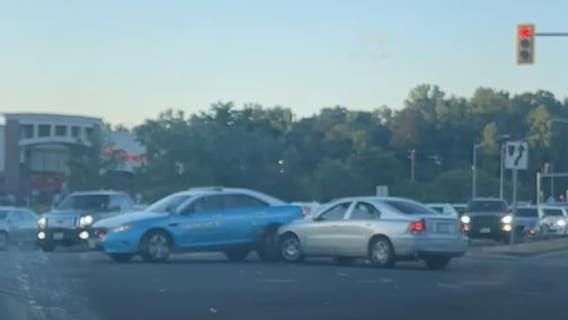 Video: Driver ‘doing doughnuts’ on Jefferson Davis Highway crashes into cop car