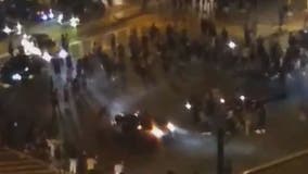 Car does donuts in downtown Silver Spring dangerously close to crowds blocking traffic, video shows