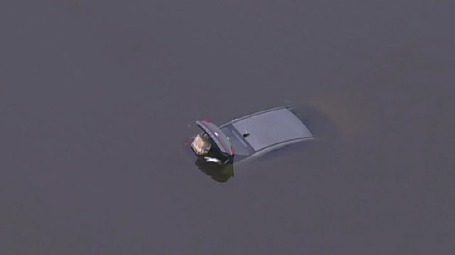 2 rescued after vehicle into lake near Dulles International Airport
