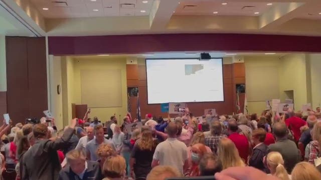 Outbursts prompt Loudoun County school officials to pause meeting; 1 person arrested