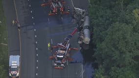 Overturned tractor trailer leaking liquid asphalt causes major delays on 495 in Montgomery County