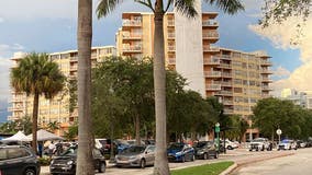 Another Florida building evacuated; search goes on at collapse site