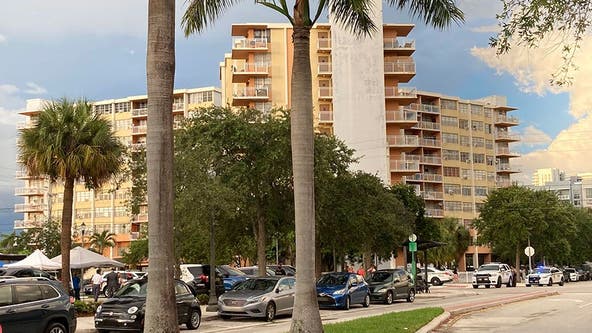 Another Florida building evacuated; search goes on at collapse site