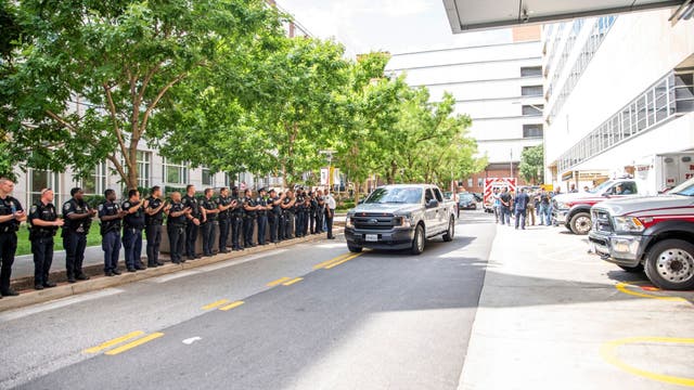 Baltimore-area cops salute officers shot in shopping center gunfight