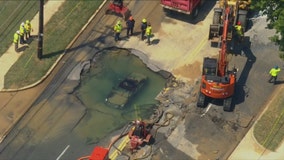 Driver evaded cones surrounding Clinton work area, crashed into sinkhole: officials