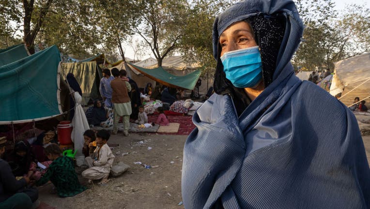 KABUL, AFGHANISTAN - AUGUST 10: Displaced Afghans arrive at a makeshift camp from the northern provinces desperately leaving their homes behind on Aug. 10, 2021, in Kabul, Afghanistan. The Taliban has taken control of several provincial capitals, among other towns and trade routes, since the United States accelerated withdrawal of its forces this year. (Photo by Paula Bronstein /Getty Images)