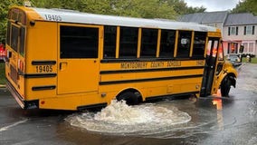 Students evacuated from Montgomery County school bus after stuck in sink hole caused by water break