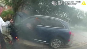 VIDEO: Off-duty police officer pulls driver from burning car after crash