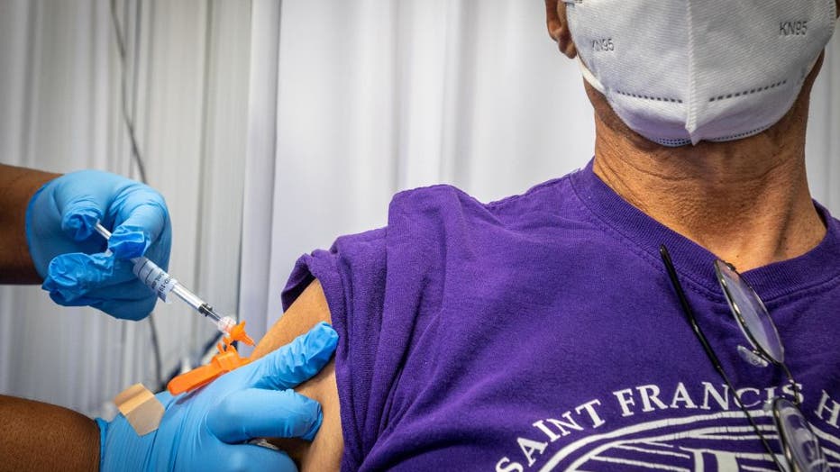 A Third COVID-19 Vaccine Shot is Administered