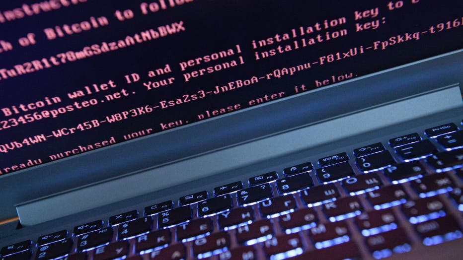 FILE - A message demanding money on a computer hacked by a virus is shown on a computer in a file image taken on June 27, 2017. (Photo by Donat SorokinTASS via Getty Images)