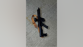 DC police shoot at man armed with rifle