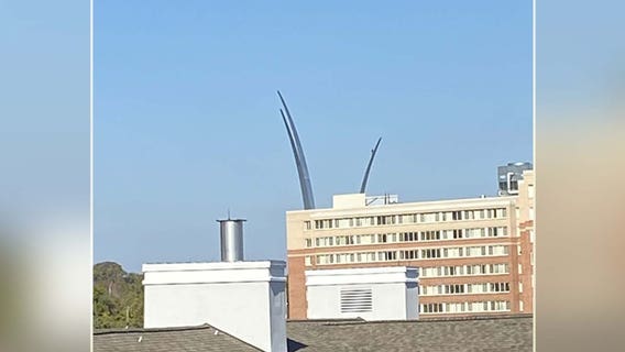 US Air Force Memorial maintenance crew causes stir online after spotted at top of monument