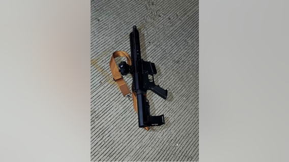 DC police shoot at man armed with rifle