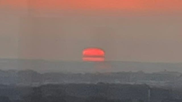 'Hamburger' sunrise appears in DC morning sky