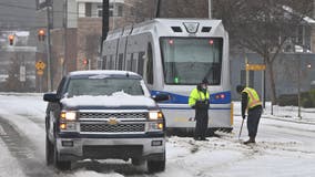 Winter storm blankets South in snow, rain for coastal Northeast