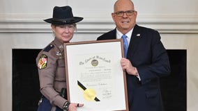 Maryland Gov. Larry Hogan honors crossing guard who saved student from being hit by car