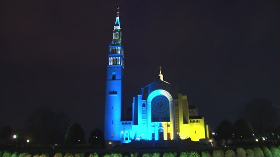 DC’s Basilica of the National Shrine glows blue and yellow in support of Ukraine