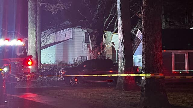 Woman dead after tree falls onto home in Crofton