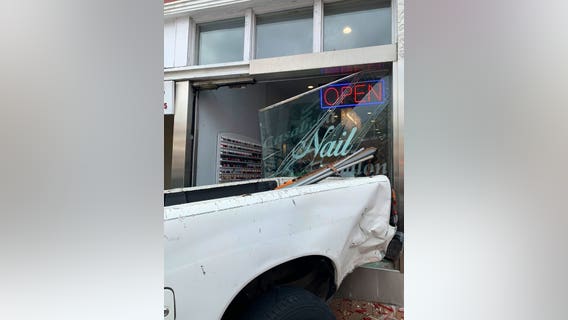 Video shows car running into Northwest DC store