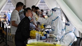 Beijing enforces lockdowns, expands COVID-19 mass testing amid outbreak