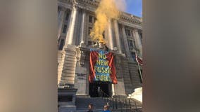 Suspect arrested after dropping protest banner from Wilson Building in DC