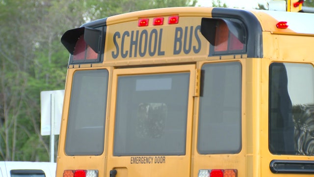 Dumfries school bus driver runs over parent's foot; Parent charged