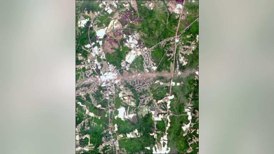 Source: National Weather Service satellite image showing damage and ground scarring across the town of La Plata