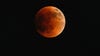 Total lunar eclipse's 'blood moon' delights across the US