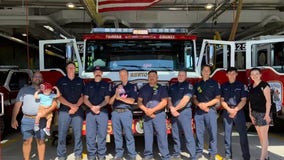 Fairfax firefighters reunite with 2-week-old baby they helped deliver