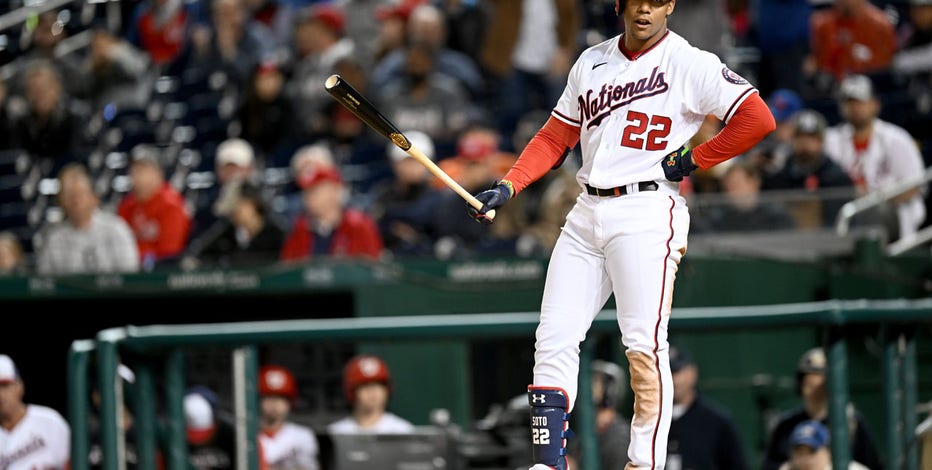 Juan Soto Washington Nationals Unsigned Poses with 2022 T-Mobile Home Run Derby Trophy Photograph