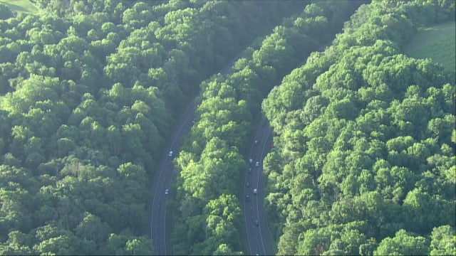 Man checking vehicle after hitting deer killed by tractor-trailer on I-70 in Frederick: police