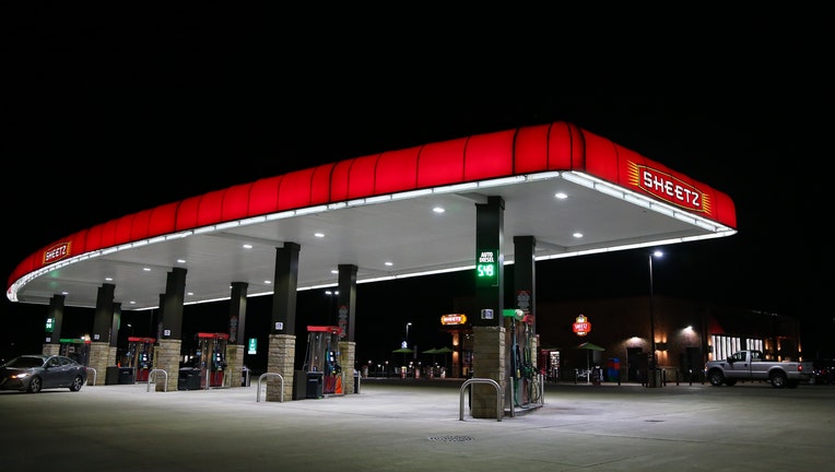 Gas pumps are seen at a Sheetz gas station. AAA reported