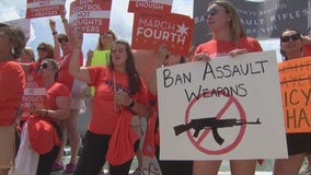 Mass shooting survivors march for nationwide ban on assault weapons