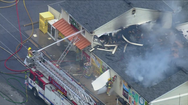 Delivery truck pulls down power lines sparking blaze that spread to Elkridge liquor store: officials