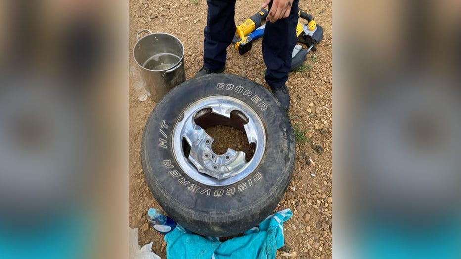 Truck-wheel-puppy-stuck.jpg