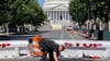 Man crashes burning car into US Capitol barricade before shooting himself: police