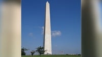 Washington Monument closes briefly after nearby car set on fire: police