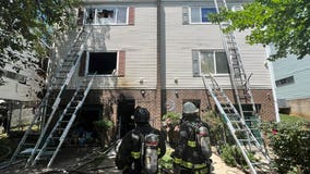 Teenager hospitalized after being rescued from duplex fire in DC