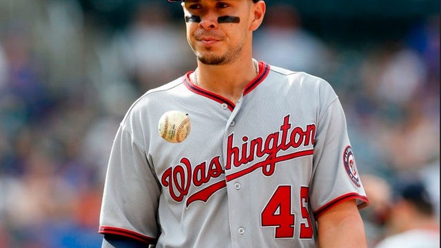 Nats' Joey Meneses signs ball for girl robbed of catch