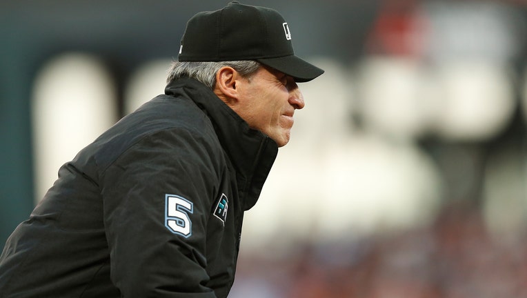 Do AL and NL MLB umpires wear a patch on their hats for their league   Quora