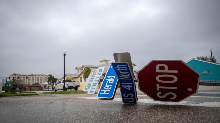 A blown down street sign is seen as the eye of Hurricane Ian passes by in Punta Gorda, Florida on September 28, 2022. - (Photo by RICARDO ARDUENGO/AFP via Getty Images)