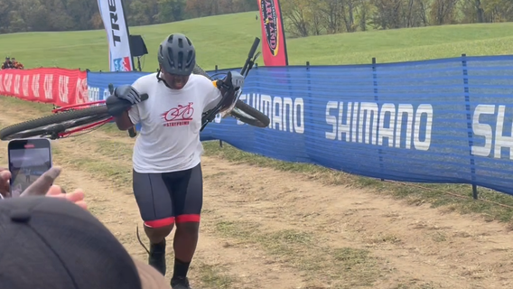 WATCH: D.C. teen carries bike over the finish line at mountain bike race